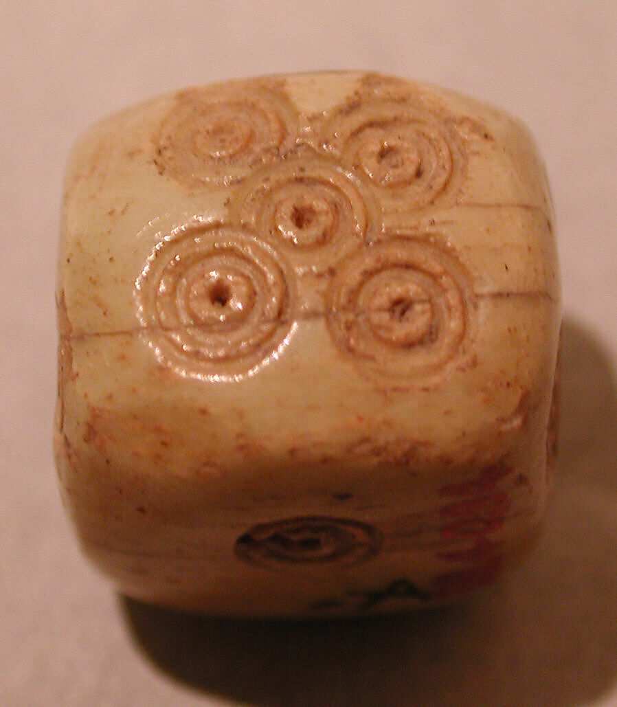 Dice, Ivory or bone; incised and inlaid with paint