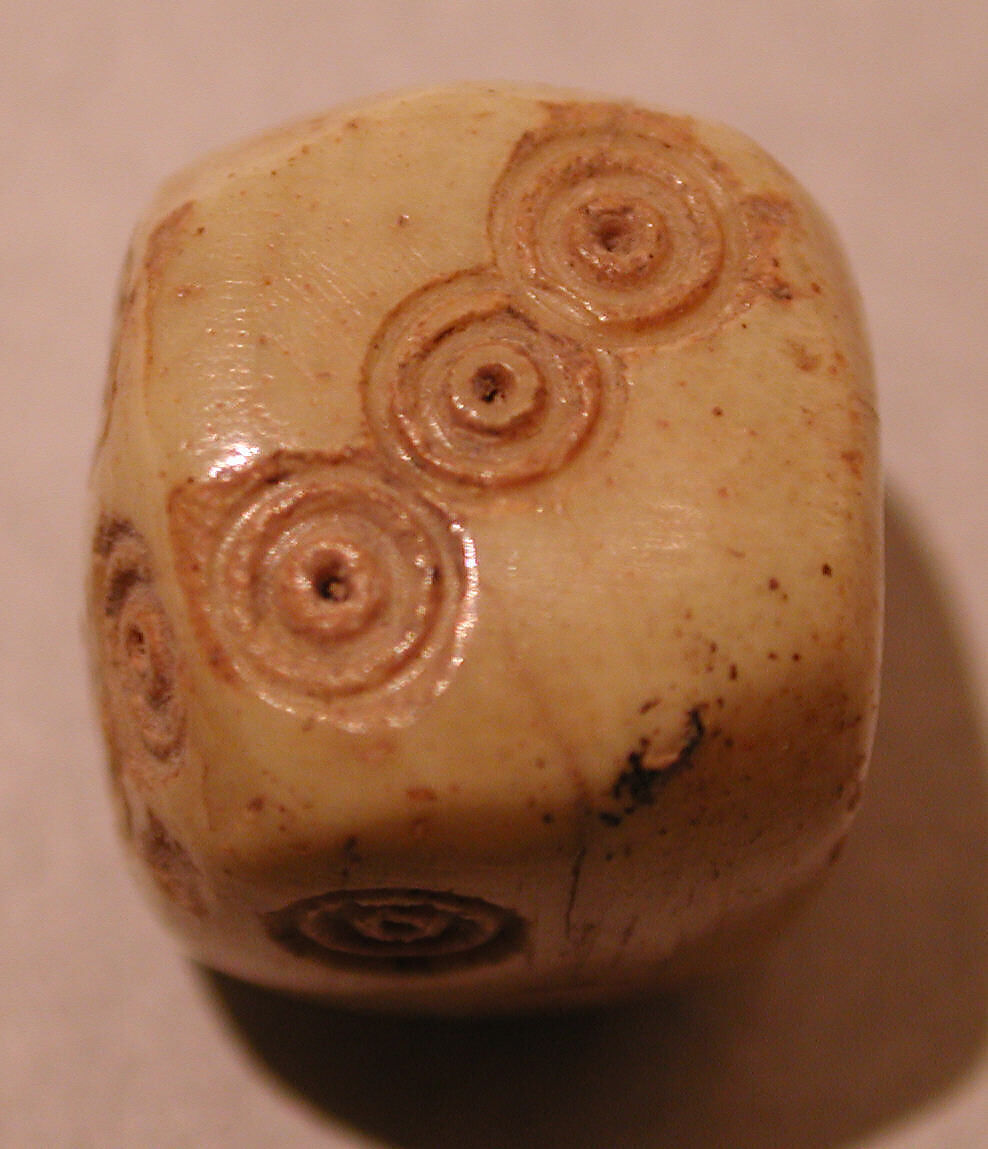 Dice, Ivory or bone; incised and inlaid with paint