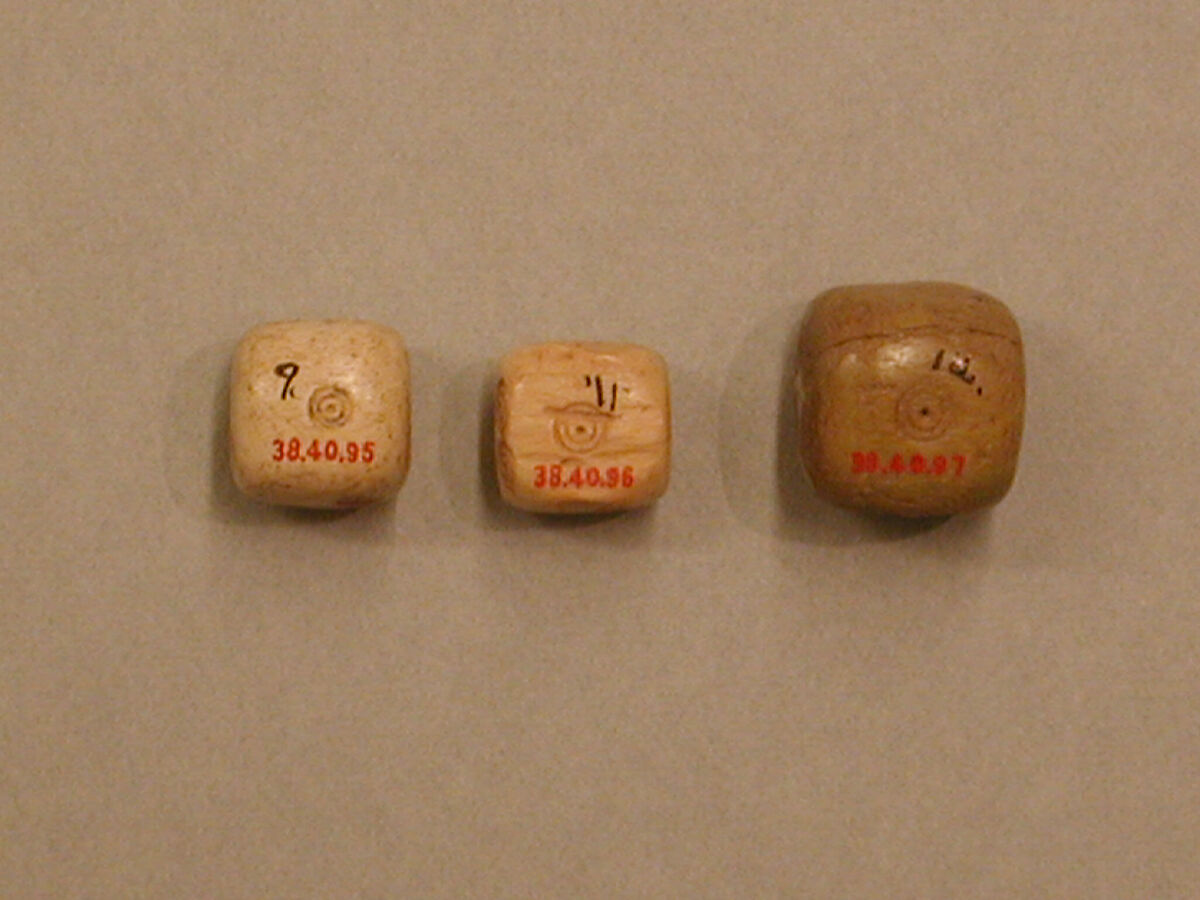 Dice, Ivory or bone; incised and inlaid with paint 