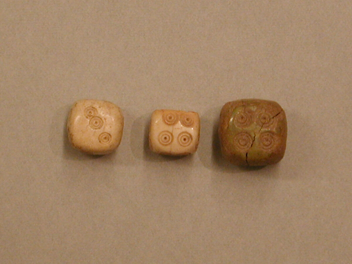 Dice, Ivory or bone; incised and inlaid with paint