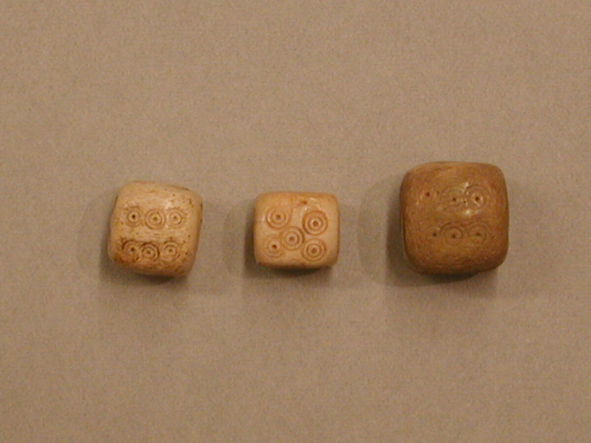 Dice, Ivory or bone; incised and inlaid with paint