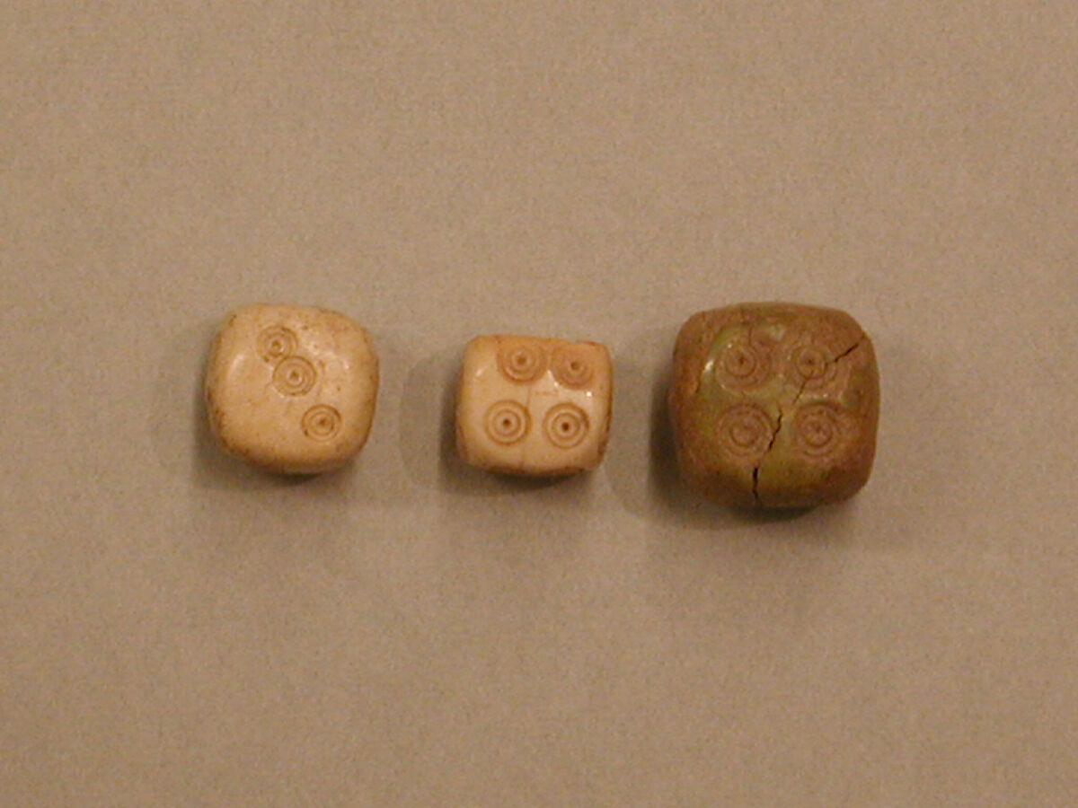 Dice, Ivory or bone; incised and inlaid with paint 