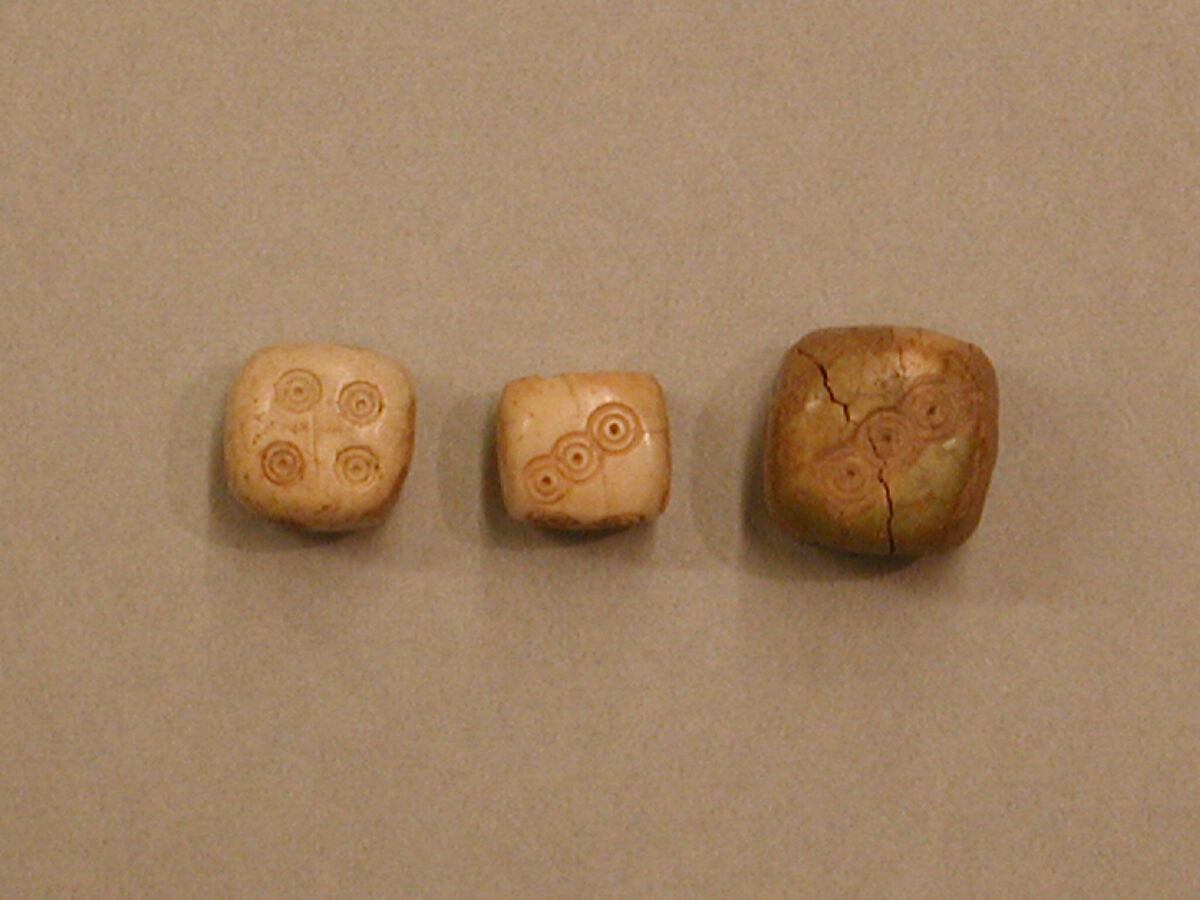 Dice, Ivory or bone; incised and inlaid with paint
