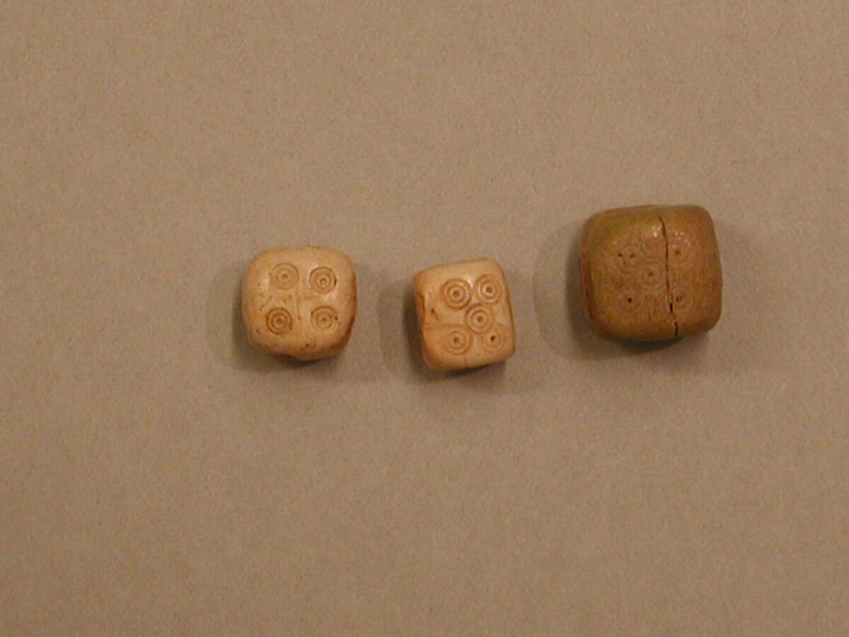 Dice, Ivory or bone; incised and inlaid with paint