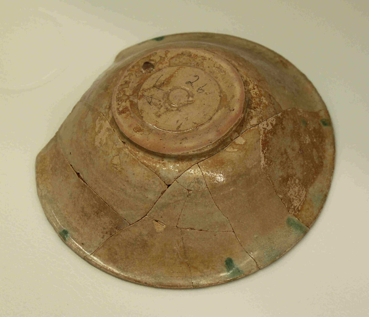 Bowl with Inscription, Earthenware; painted in black with splashes of green on opaque white (tin) glaze