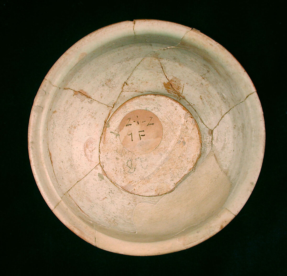 Three Bowls with Floriated Kufic Inscriptions, Earthenware; white slip with black slip decoration under transparent glaze