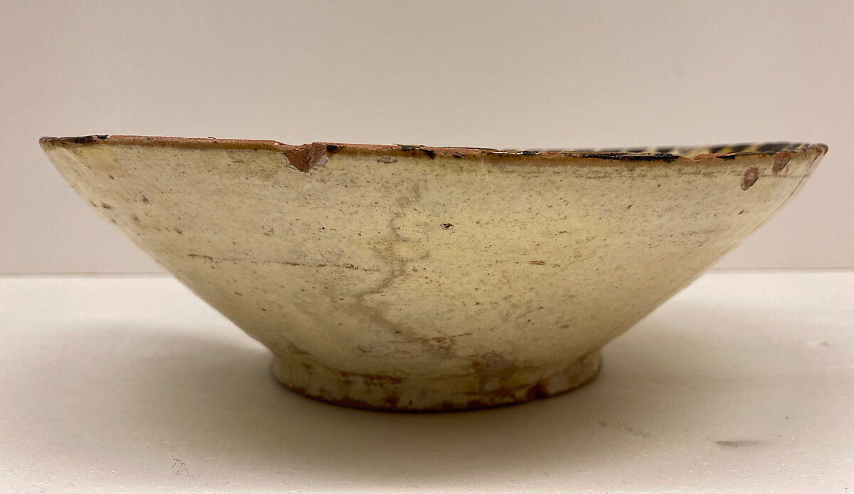 Bowl, Earthenware; white slip under clear yellow glaze