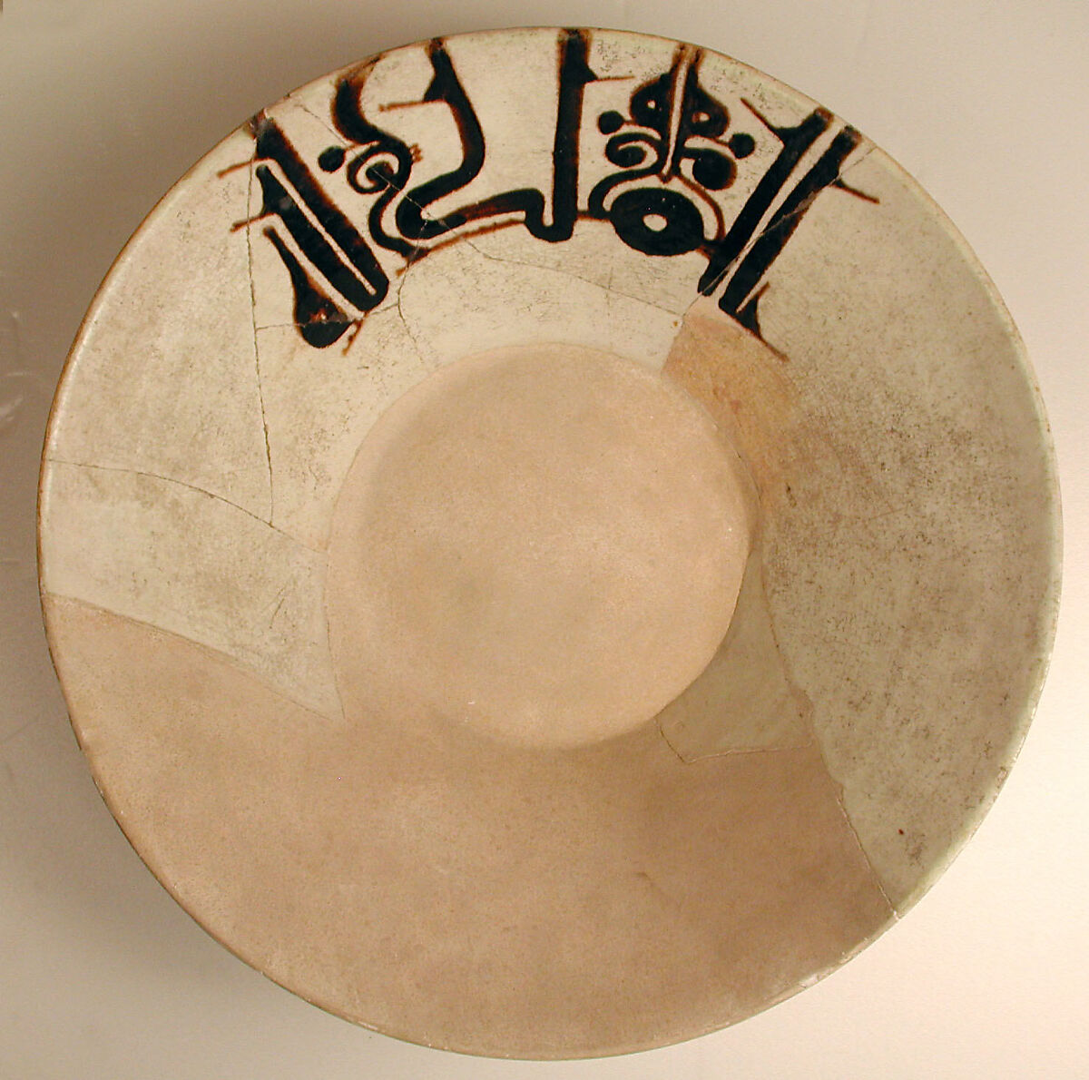 Bowl with Inscription, "Sovereignty is God's", Earthenware; white slip with black slip decoration under transparent glaze