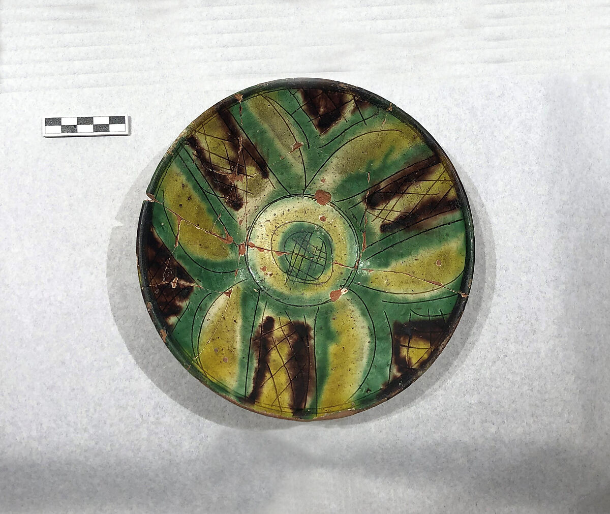Bowl, Earthenware; white slip, incised and splashed with polychrome glazes under transparent glaze (sgraffito ware)