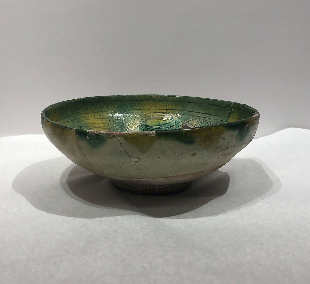Bowl, Earthenware; white slip, incised and splashed with polychrome glazes under transparent glaze (sgraffito ware)