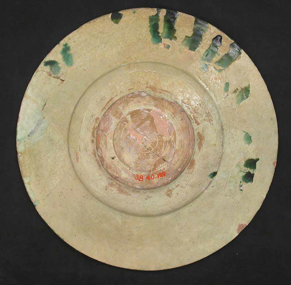 Plate, Earthenware; white slip, incised and splashed with polychrome glazes under transparent glaze (sgraffito ware)