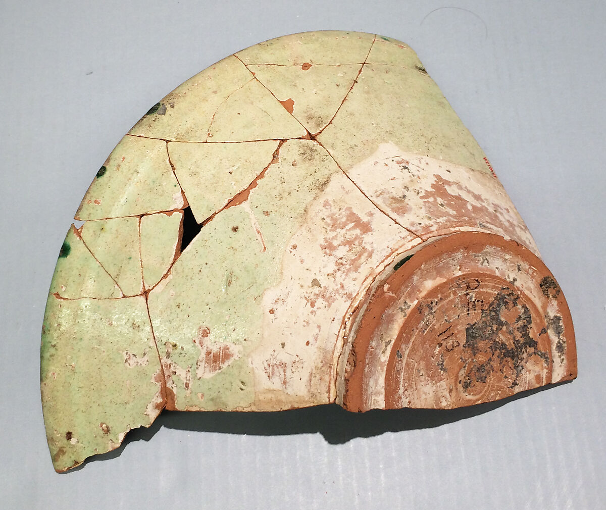 Fragments of a Bowl, Earthenware; white slip, incised and splashed with polychrome glazes under transparent glaze (sgraffito ware)