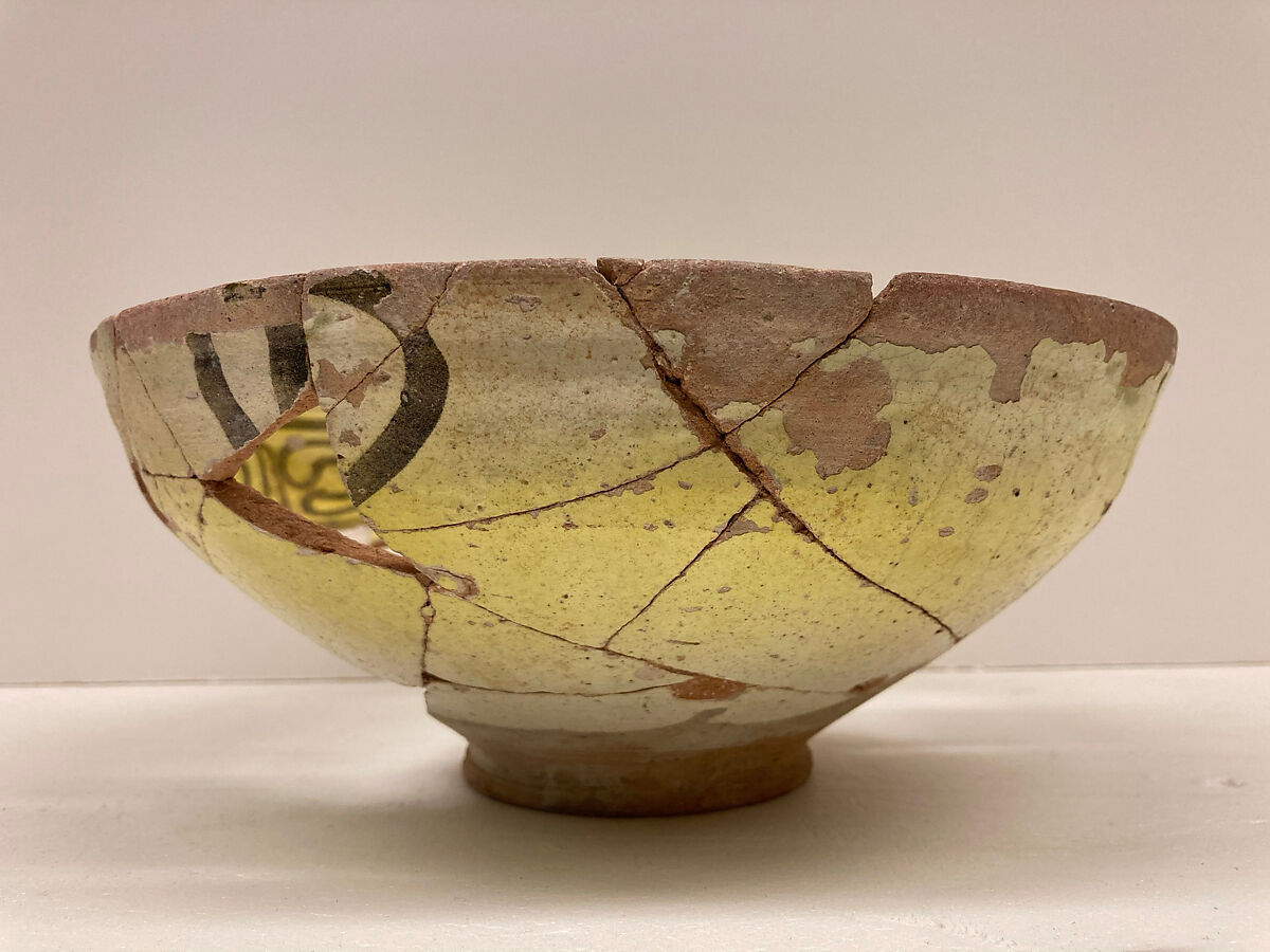 Bowl, Earthenware; white slip under transparent glaze running from pale greenish at center to strong yellow at rim