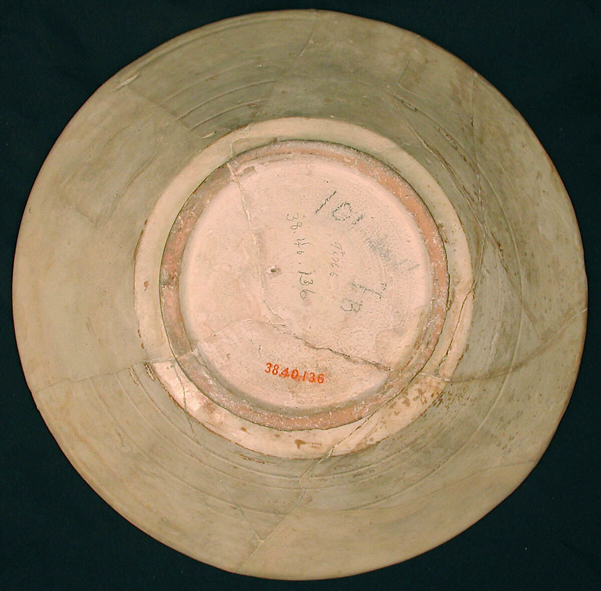 Bowl, Earthenware; slip covered with monocrhome slip decoration under transparent glaze