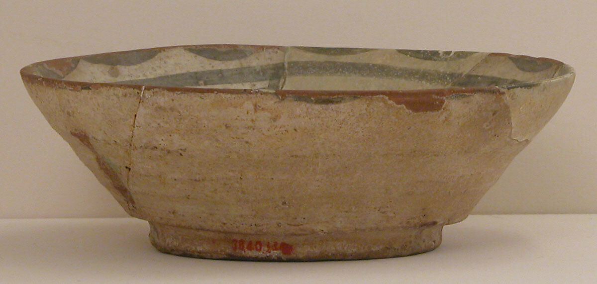 Bowl, Earthenware; white slip with monochome slip decoration under transparent glaze