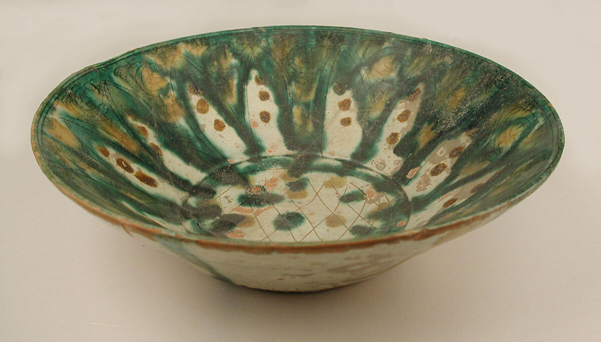 Bowl, Earthenware; white slip, incised and splashed with polychrome glazes under transparent glaze (sgraffito ware)