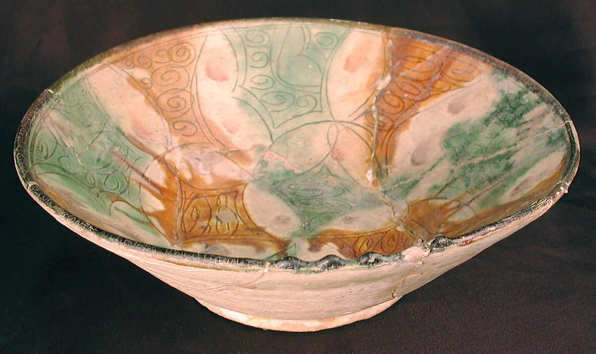 Bowl, Earthenware; white slip, incised and splashed with polychrome glazes under transparent glaze (sgraffito ware)