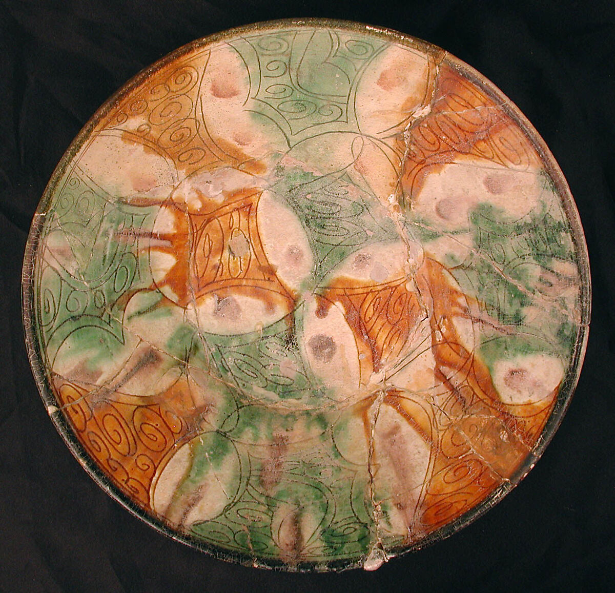 Bowl, Earthenware; white slip, incised and splashed with polychrome glazes under transparent glaze (sgraffito ware) 