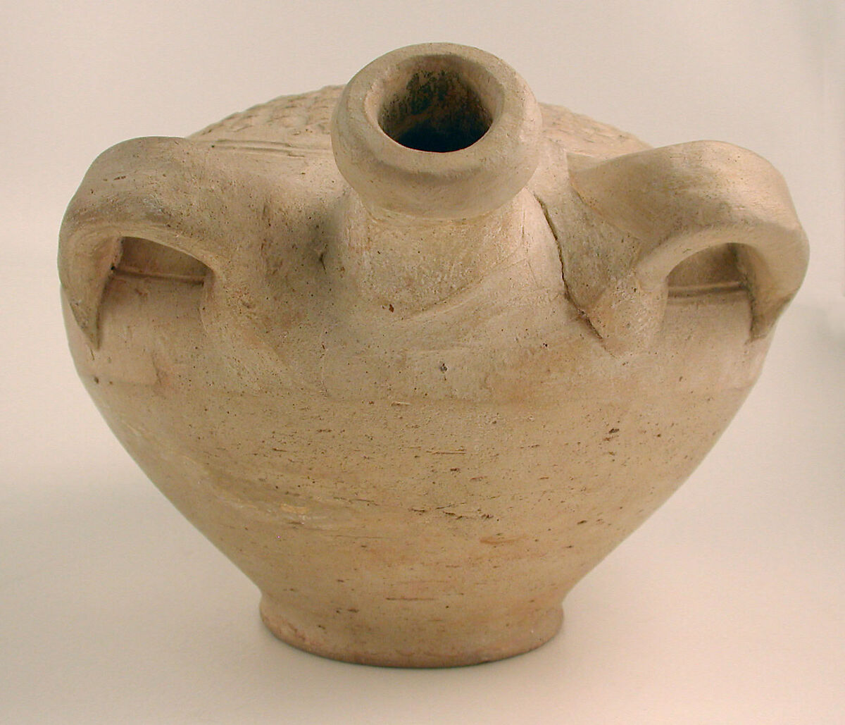 Flask with Molded Decoration, Earthenware; molded decoration, unglazed
