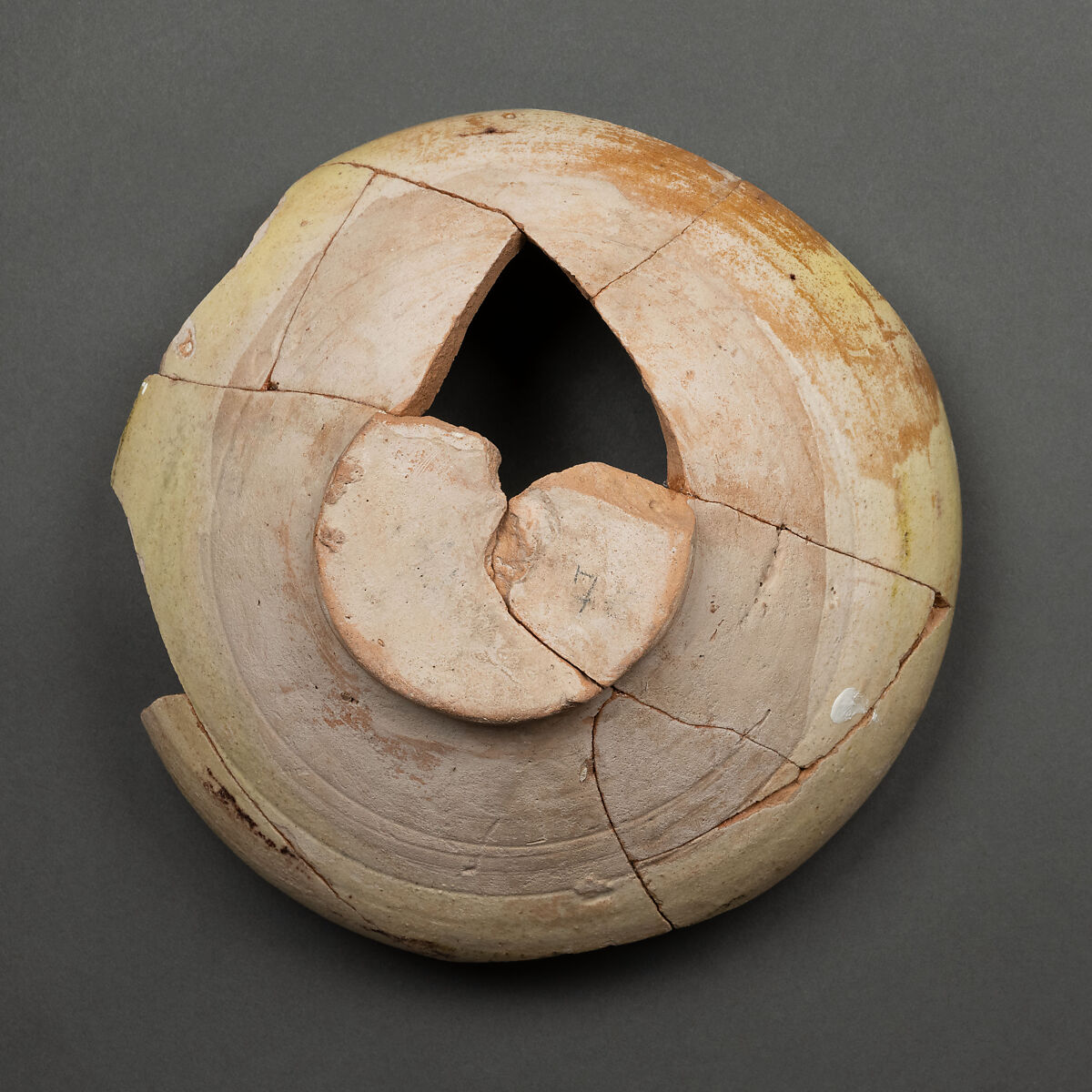 Bowl, Earthenware; white slip with polychrome slip decoration under yellowish transparent glaze