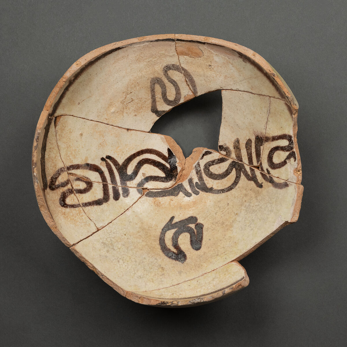 Bowl, Earthenware; white slip with polychrome slip decoration under yellowish transparent glaze