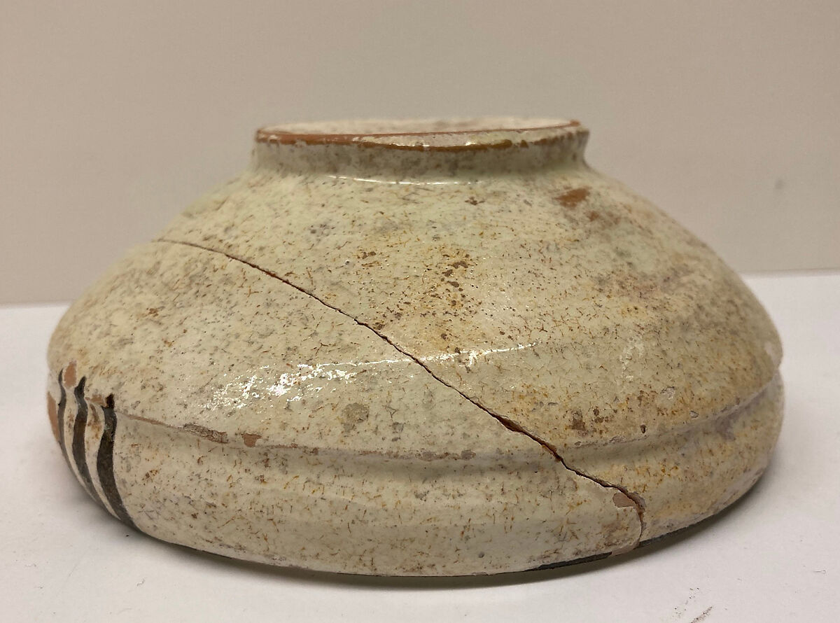 Bowl, Earthenware; white slip with monochrome slip decoration under transparent glaze