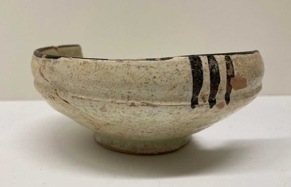 Bowl, Earthenware; white slip with monochrome slip decoration under transparent glaze