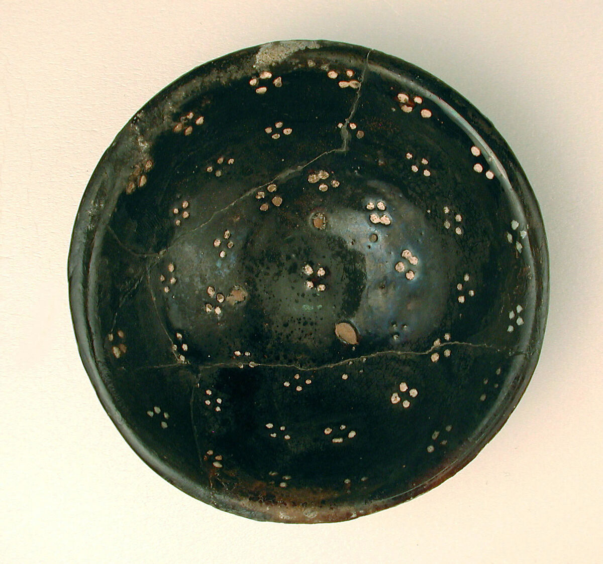 Bowl, Earthenware; black slip with white slip decoration under transparent glaze 