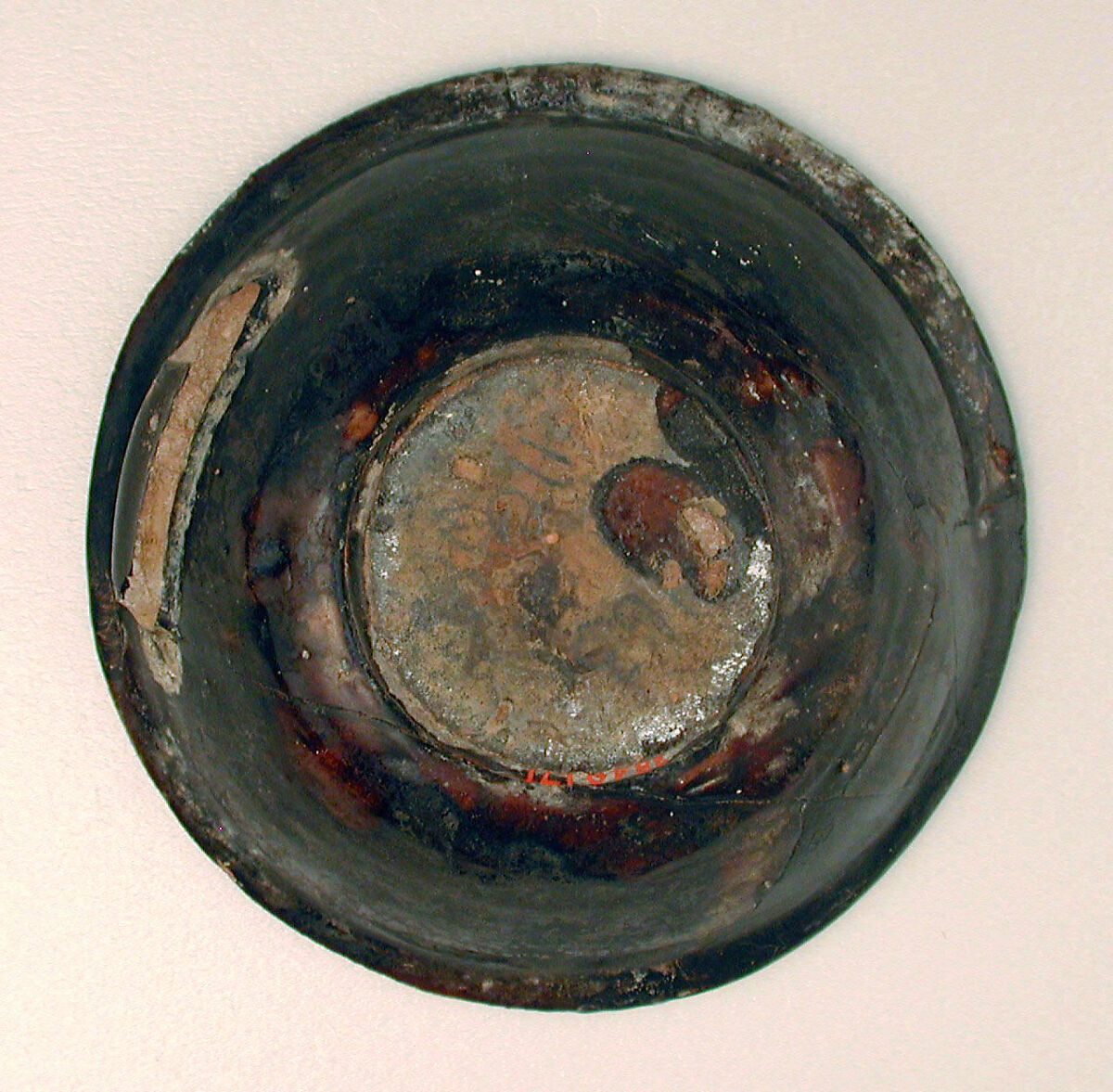 Bowl, Earthenware; black slip with white slip decoration under transparent glaze