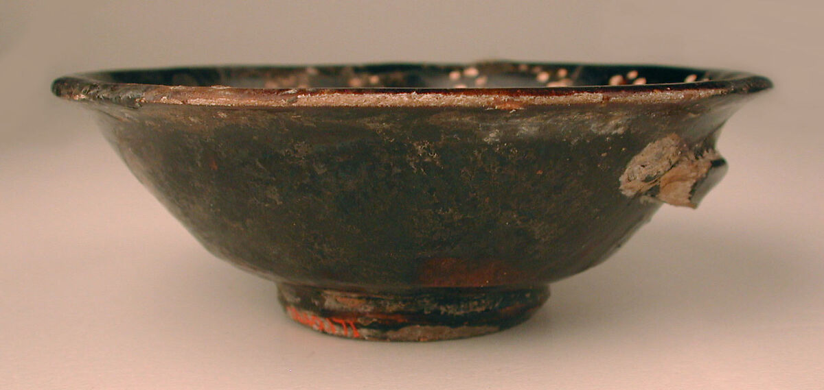 Bowl, Earthenware; black slip with white slip decoration under transparent glaze