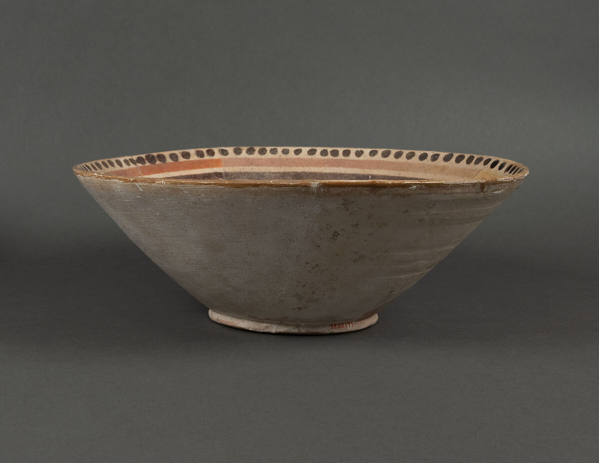 Bowl, Earthenware; white slip with polychrome slip decoration under transparent glaze