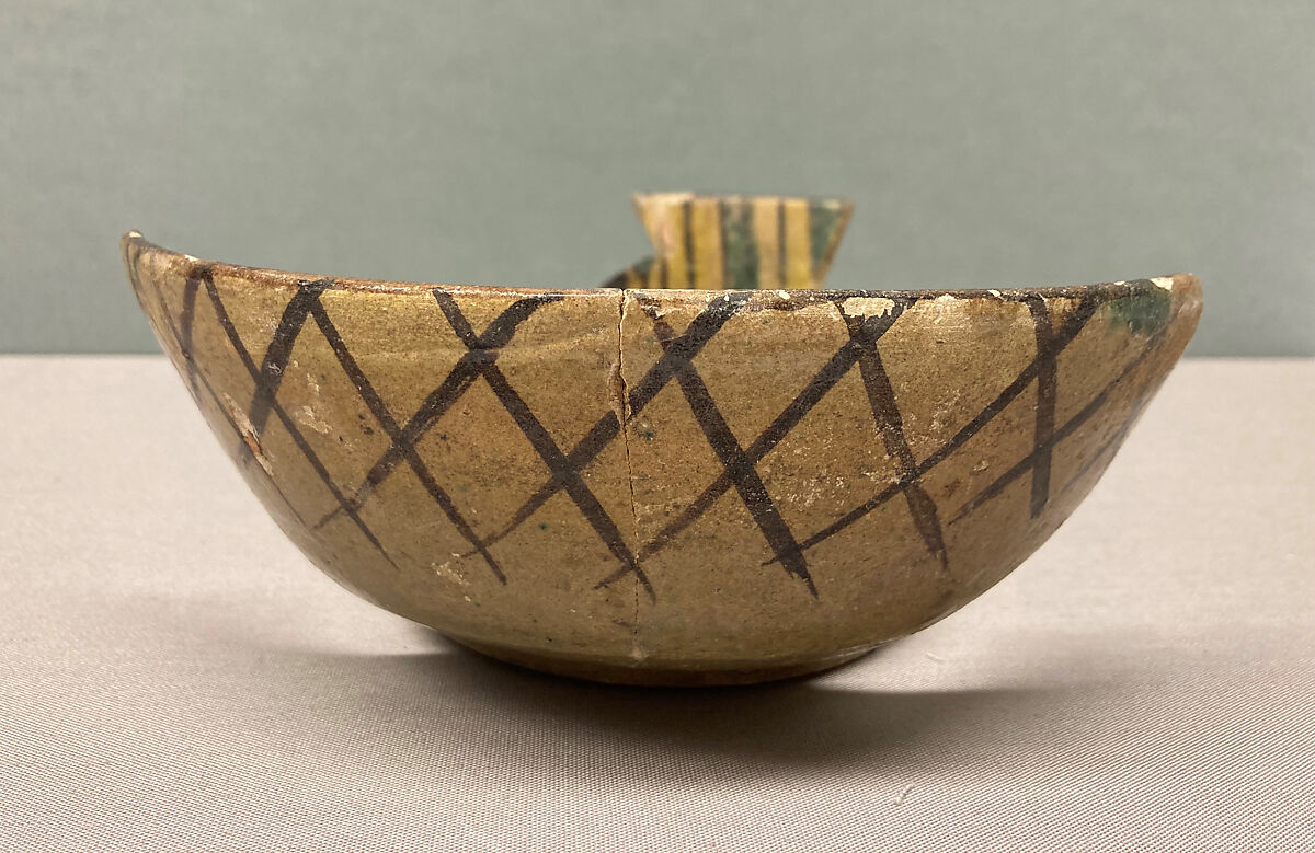 Bowl, Earthenware; painted in black slip and polychrome pigments under transparent colorless glaze (buff ware)