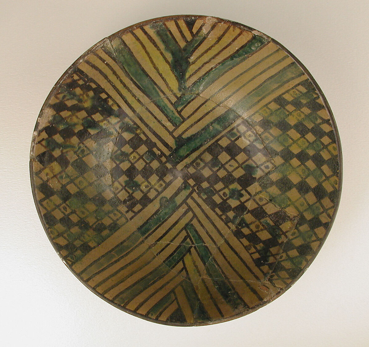 Bowl, Earthenware; painted in black slip and polychrome pigments under transparent colorless glaze (buff ware)