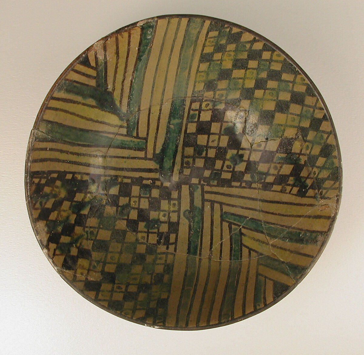 Bowl, Earthenware; painted in black slip and polychrome pigments under transparent colorless glaze (buff ware)
