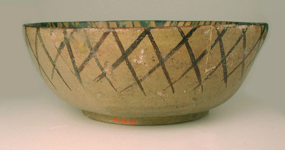 Bowl, Earthenware; painted in black slip and polychrome pigments under transparent colorless glaze (buff ware)