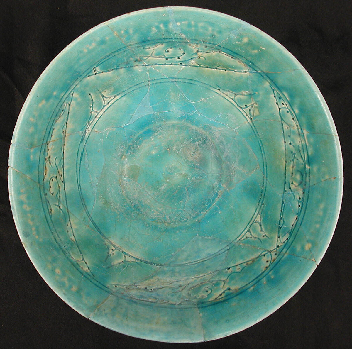Bowl, Earthenware; white slip under turquoise glaze, incised