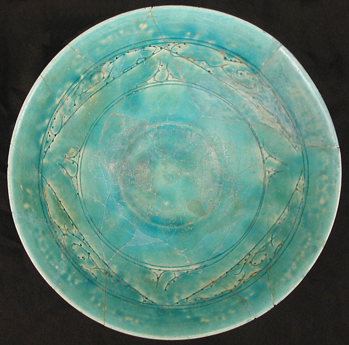 Bowl, Earthenware; white slip under turquoise glaze, incised