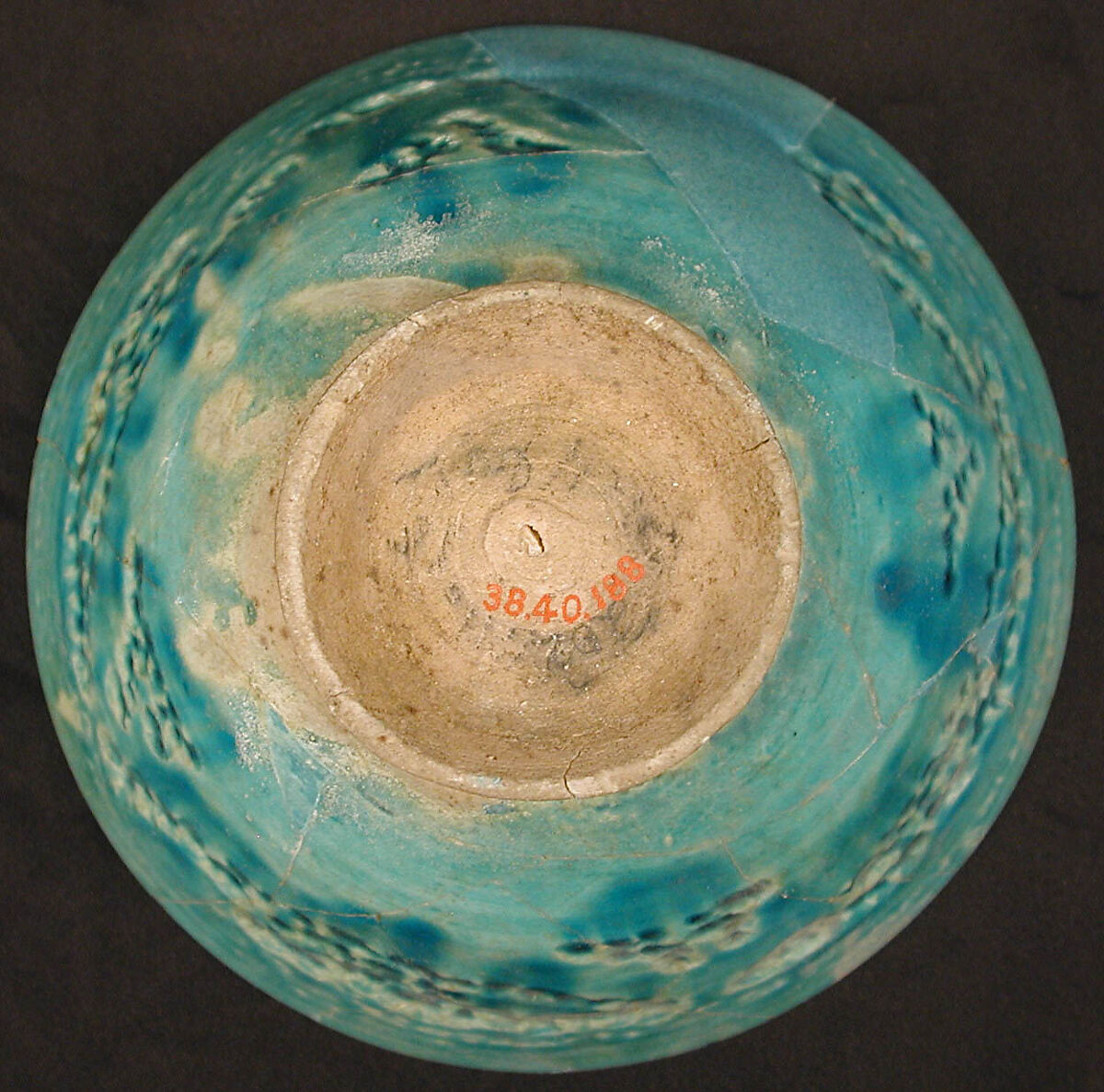 Bowl, Earthenware; white slip under turquoise glaze, incised
