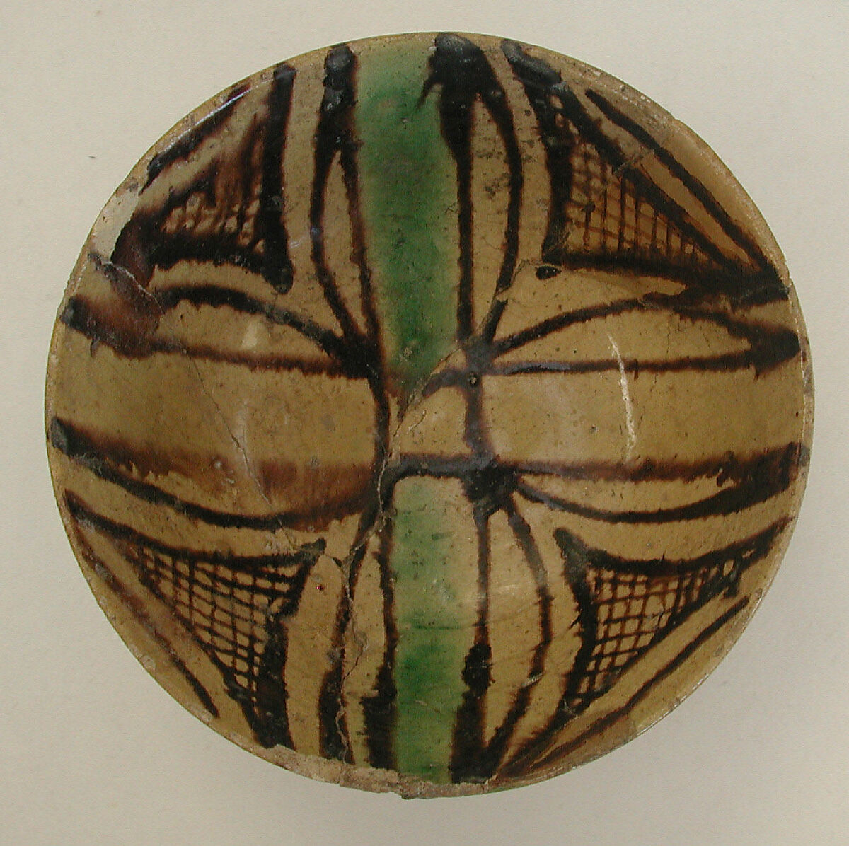 Dish, Earthenware; polychrome pigments under transparent glaze (buff ware)