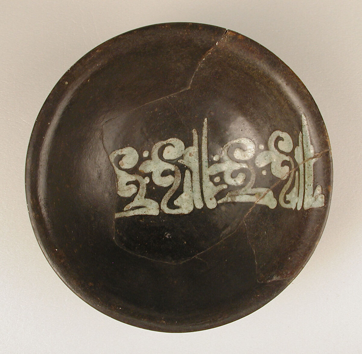 Bowl, Earthenware; red-brown slip with white slip decoration under transparent glaze 