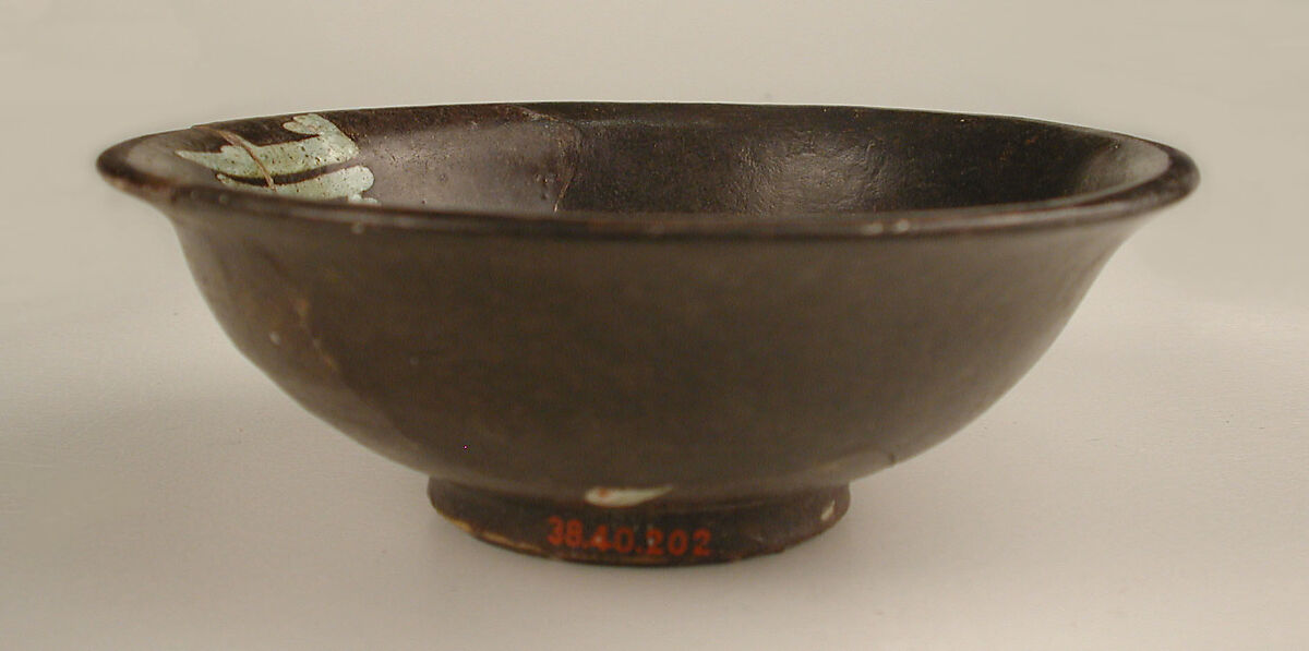 Bowl, Earthenware; red-brown slip with white slip decoration under transparent glaze