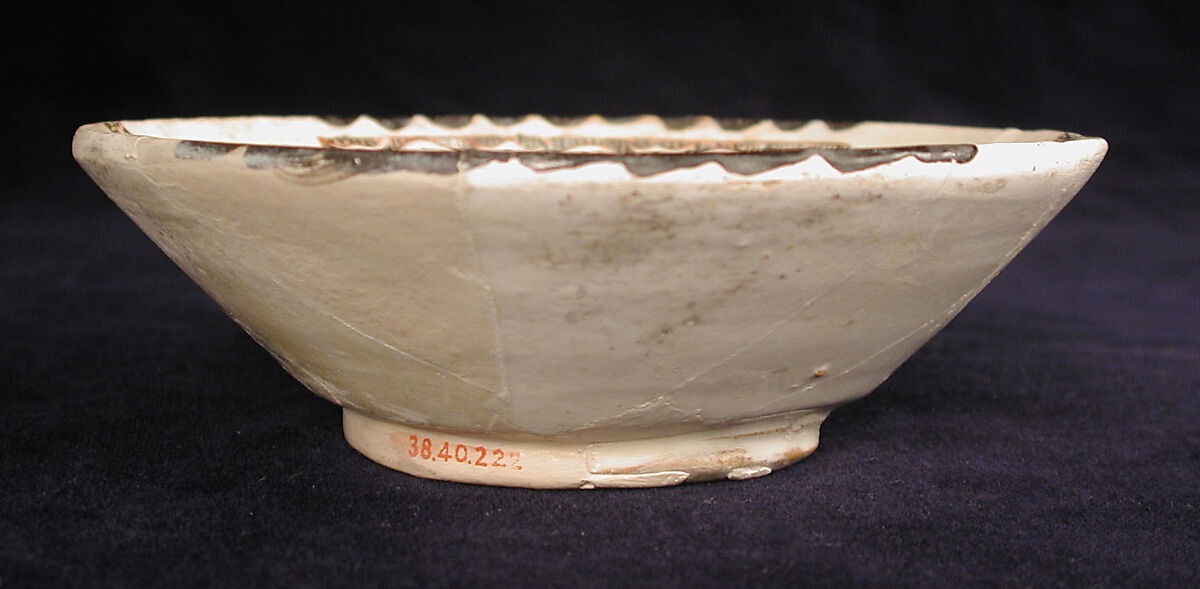 Bowl, Earthenware; white slip with polychrome slip decoration under transparent glaze