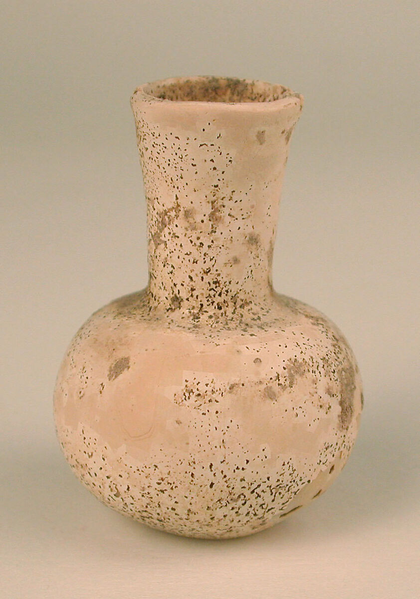 Bottle, Glass, colorless; blown (now opaque) 