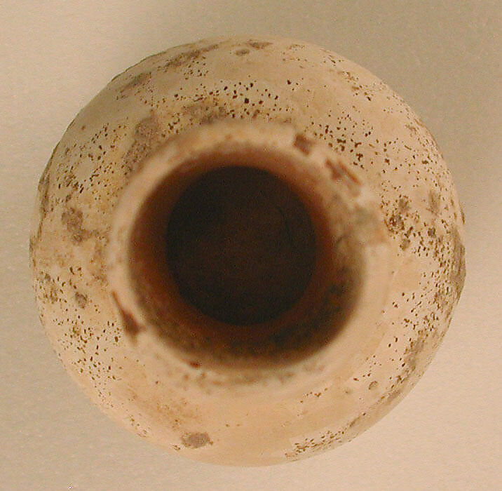 Bottle, Glass, colorless; blown (now opaque)