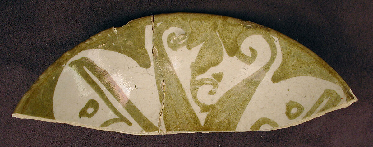 Fragment of a Bowl, Earthenware; luster-painted on opaque white glaze