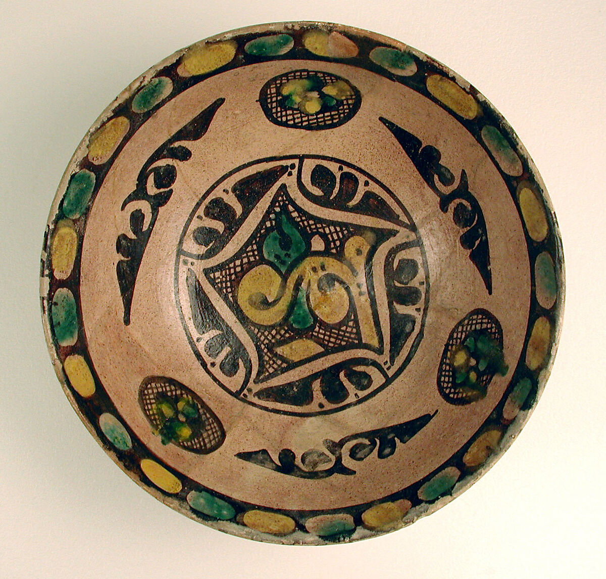 Buffware Bowl with Geometric Designs, Earthenware; polychrome decoration under transparent glaze (buff ware) 