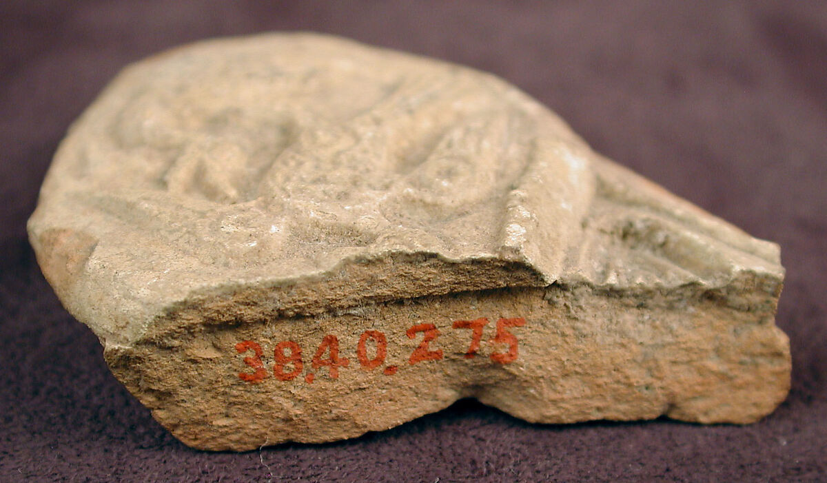 Fragment of a Molded Vessel with Birds in Combat, Earthenware; molded, unglazed