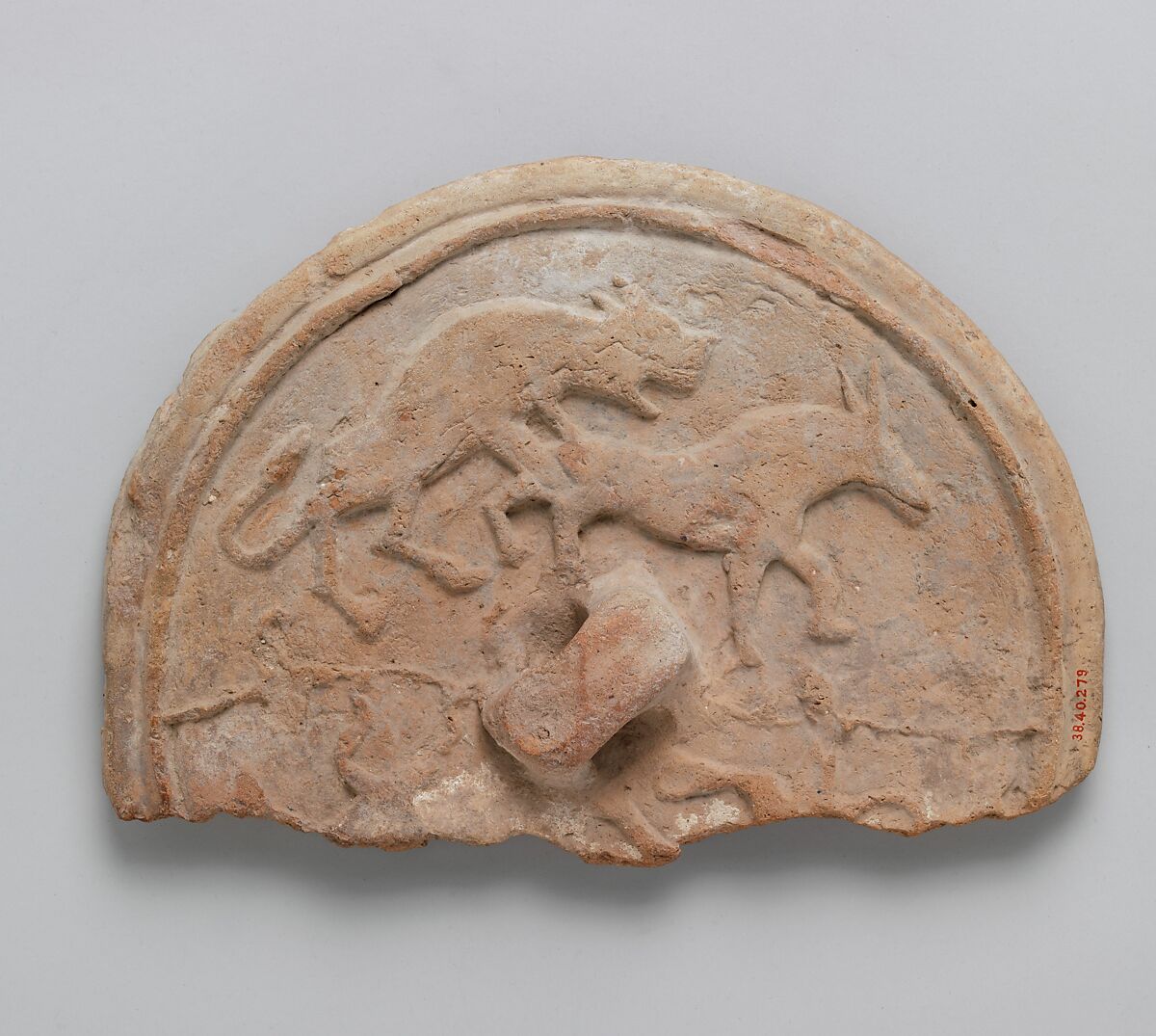 Lid with a Lion attacking a Bull, Earthenware; molded decoration, unglazed 