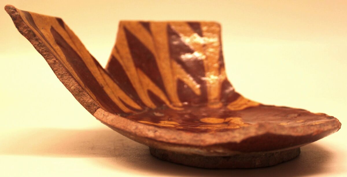 Fragment of a Bowl, Earthenware; red and yellow slip decoration under transparent glaze