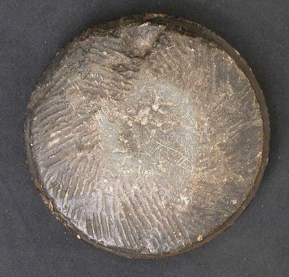 Die (?), Stone; carved